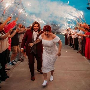 Size large shimmery fitted dress! Changed into at the end of my wedding! So fun!